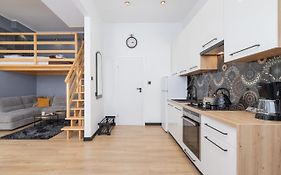 Ariańska Studio with Mezzanine Cracow Center by Renters